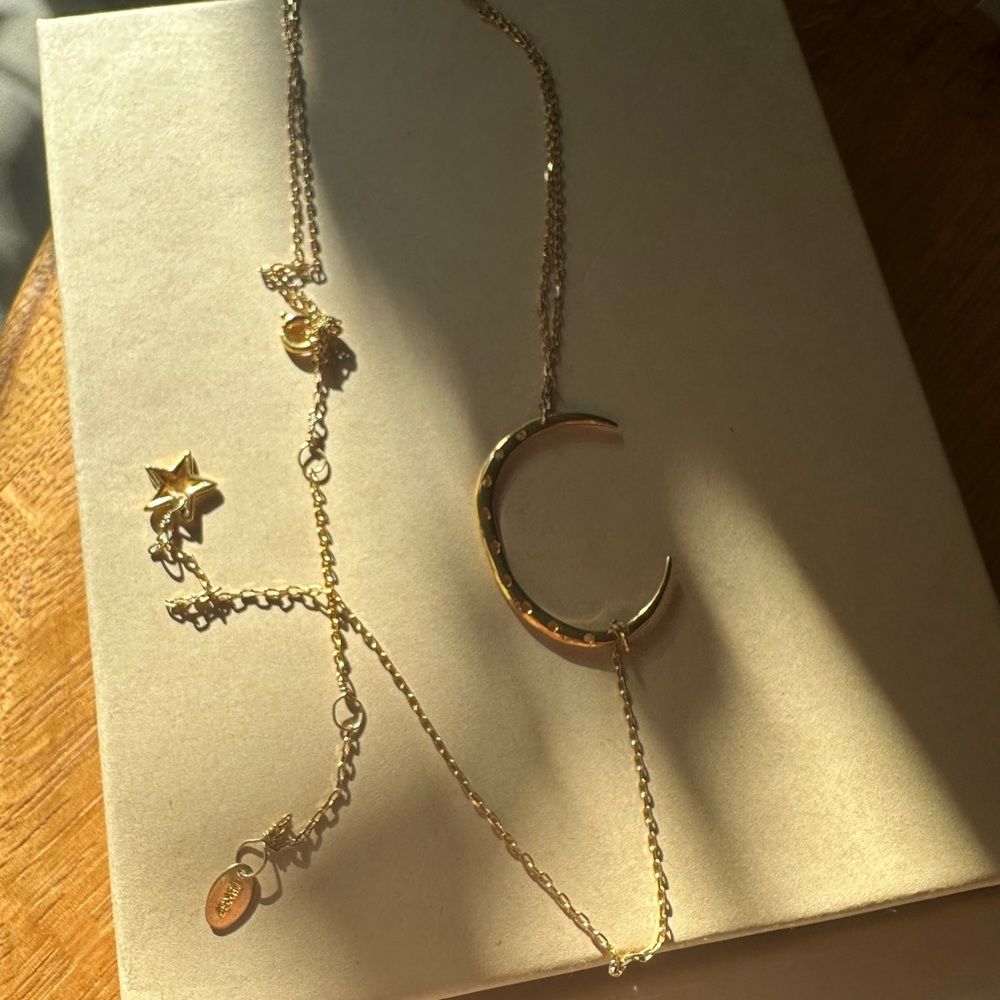 Gold plated moon and star drop necklace